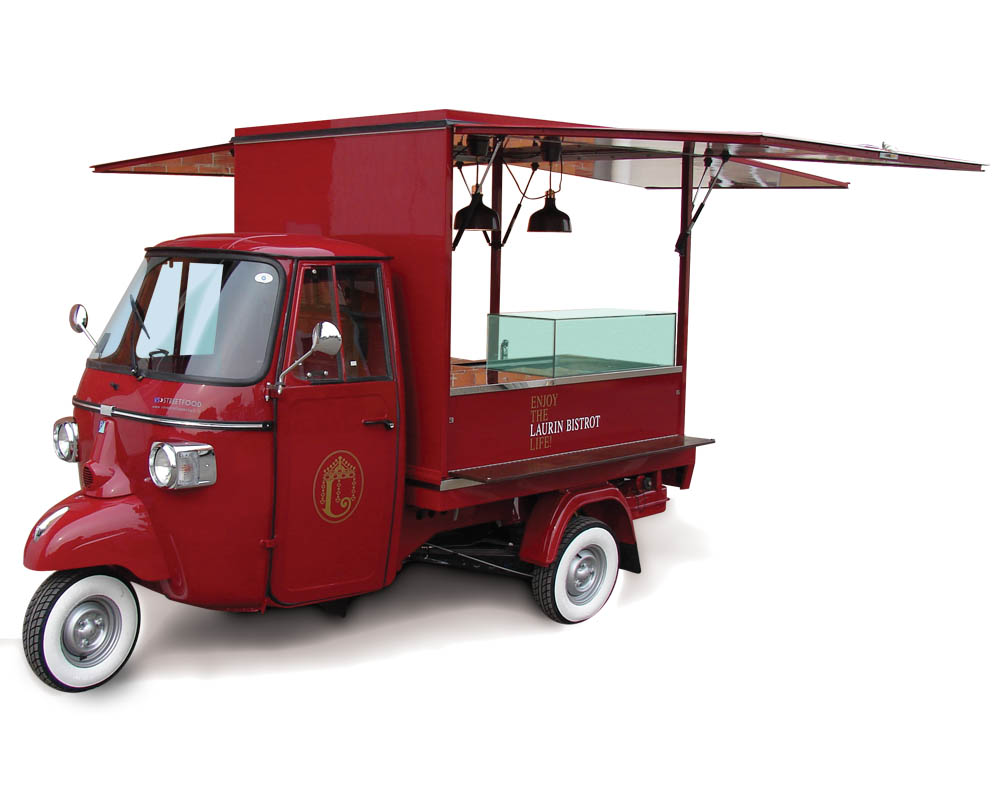 Laurin Hotel Bistrot on Piaggio Ape Car selling drinks and cocktails