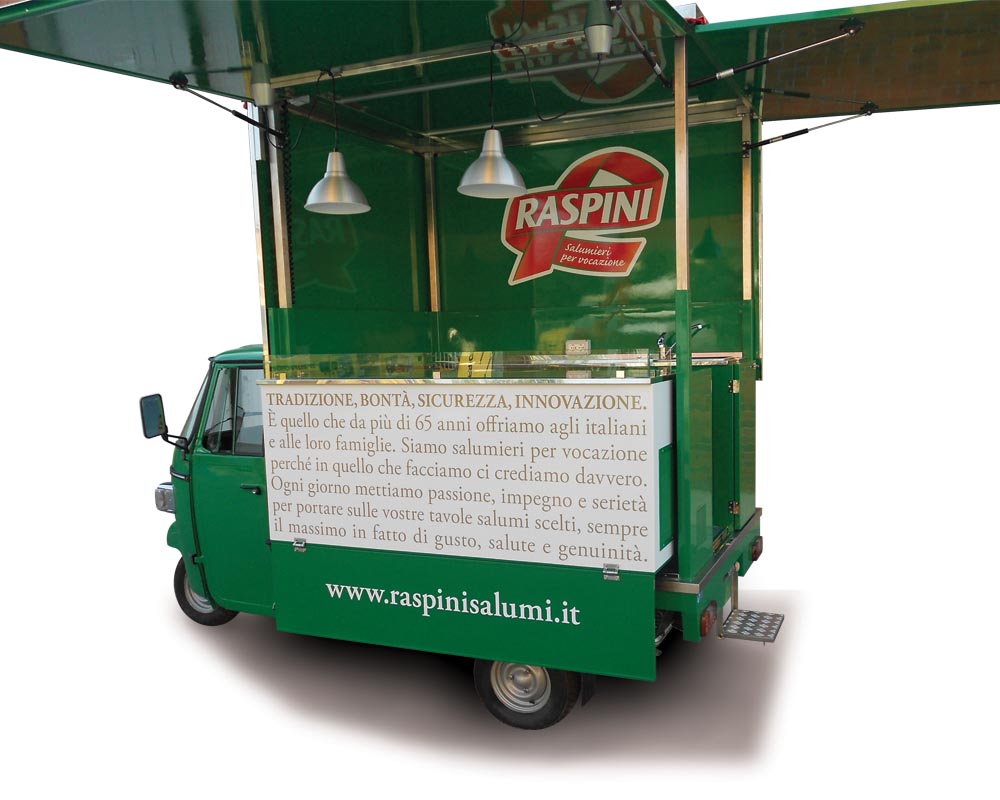 Street food ape car of Raspini company. Converted vehicle to sell salami and cured meats