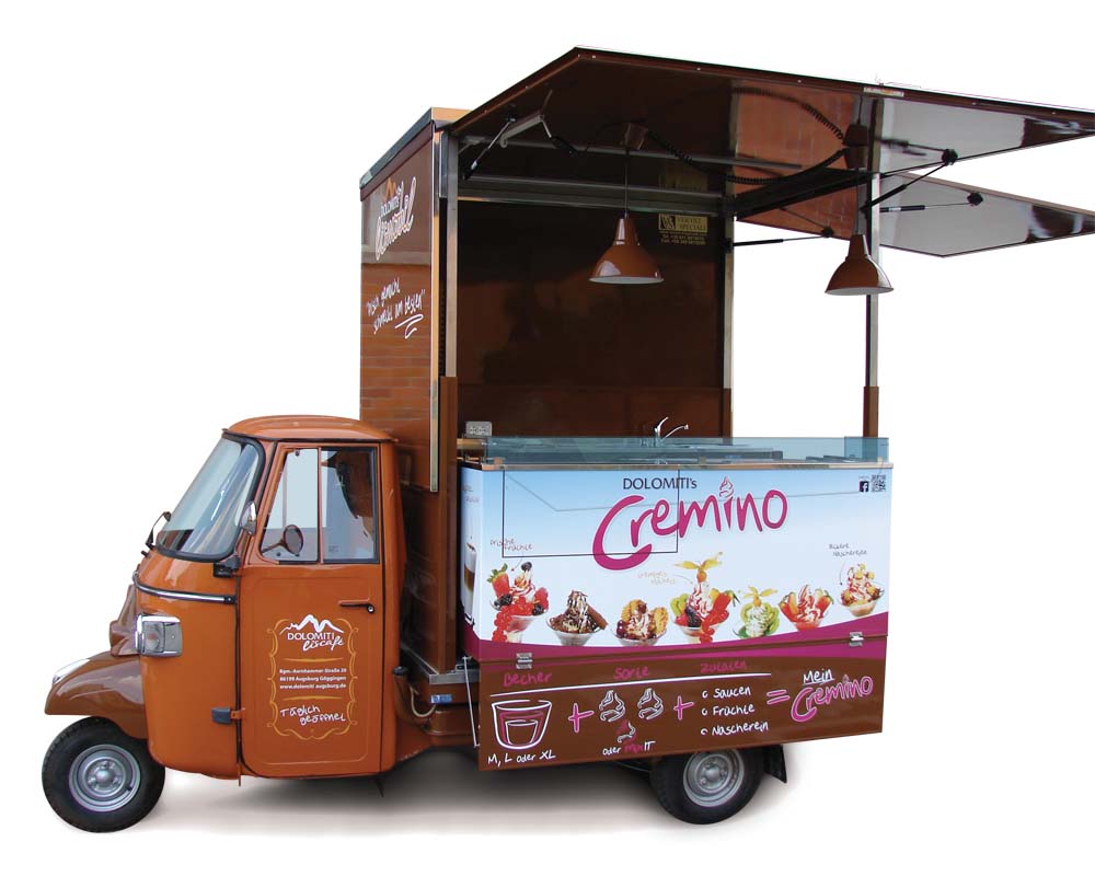 organic moving ice-cream shop on piaggio apecar in Dolomiti area