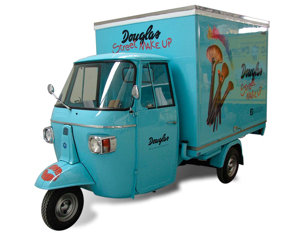 promotional truck piaggio for the company douglas make-up