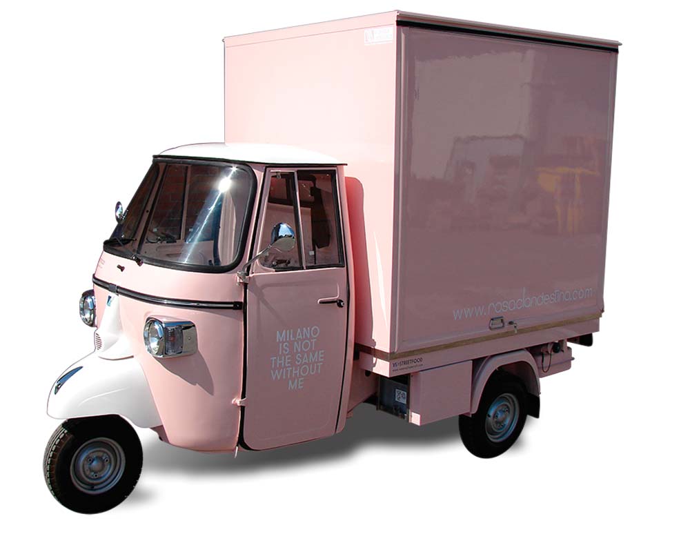 piaggio ape shop for fashion brand Rosa Clandestino in pink colour