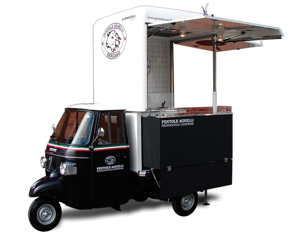 ape piaggio promozionale pentole agnelli con cucina per show cooking