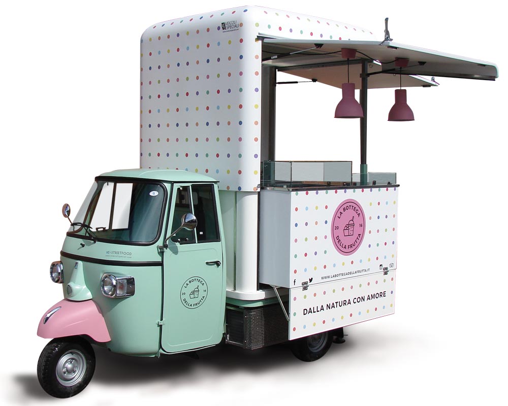 Piaggio Van converted in street food van for vending smoothies and juicers in Milan
