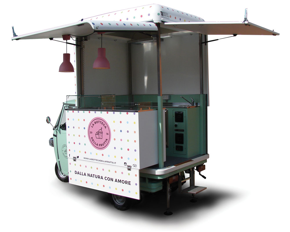 Piaggio Van designed for street food selling smoothies and juicers in Milan