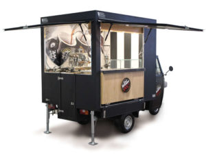 Concept of italian cafeteria recalled on a Vergnano Piaggio Ape TR