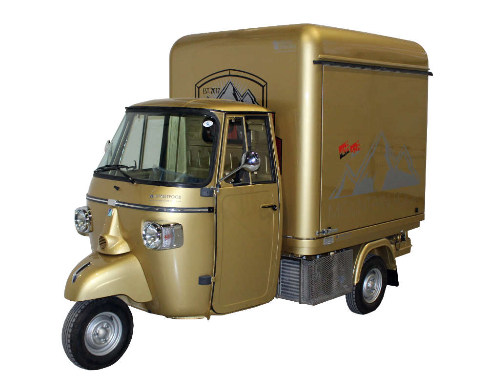 Mobile Wine Bar Alpen in Switzerland, golden colour and new integrated tapping system to extract wine directly from the bottles