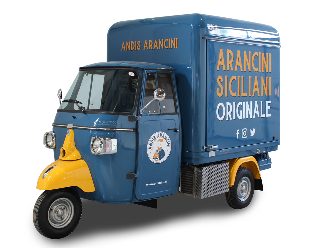 ape piaggio v curve andis arancini siciliani con colori blu e giallo