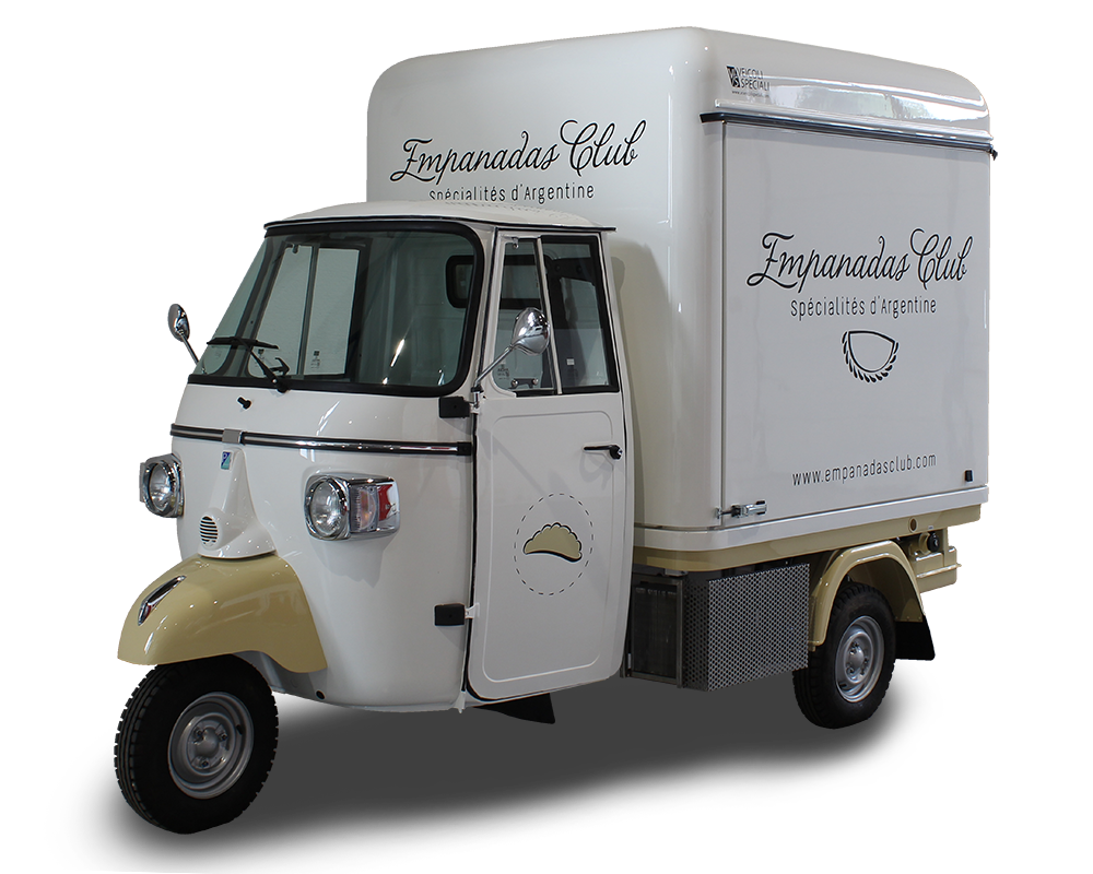 mobile kitchen outfitted on retro-style vcurved piaggio apecar designed for selling empanadas and more traditional argentine dishes