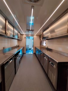 service trailer equipped for storing and washing restaurant supplies