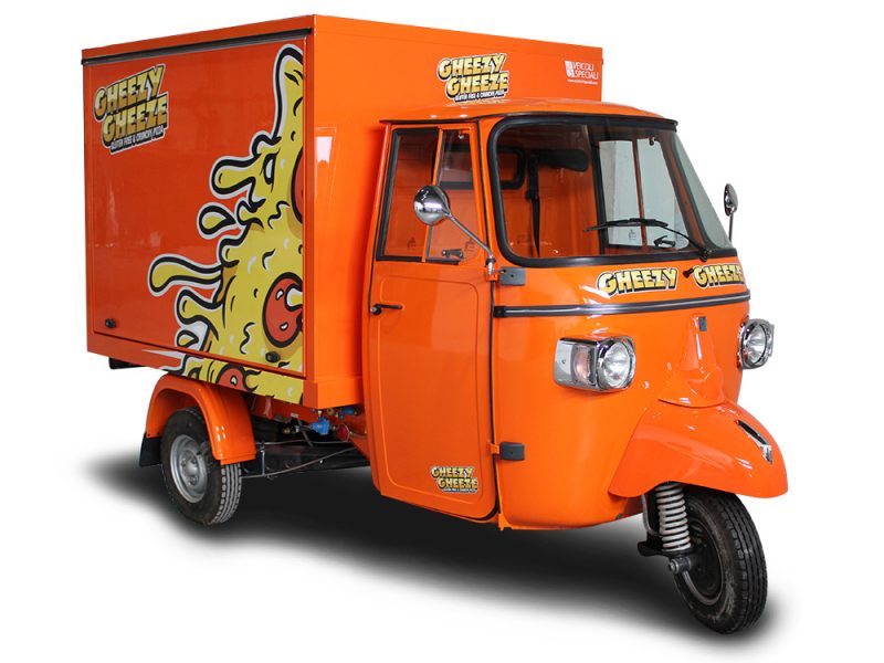 pizza ape car of orange colour and stickers in Finland